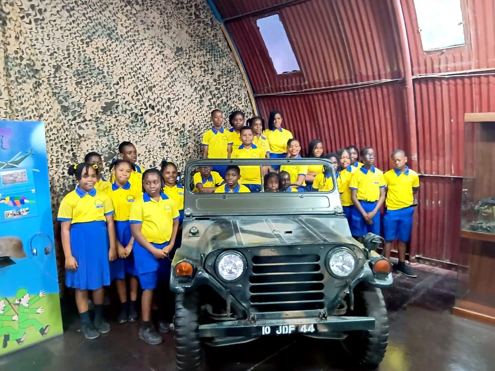 Pupils on a Jamaica Defence Force museum field trip