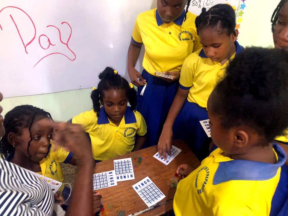 Pupils playing a numeracy bingo game in class