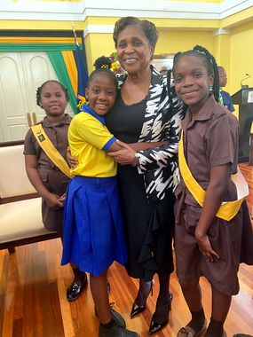 A pupil meeting a dignitary