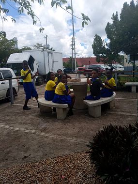 Pupils enjoying a treat outdoors