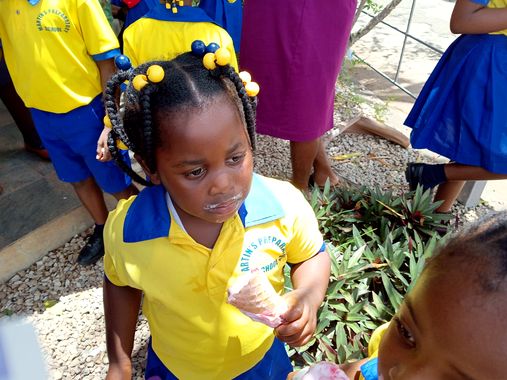 A pupil enjoying a treat